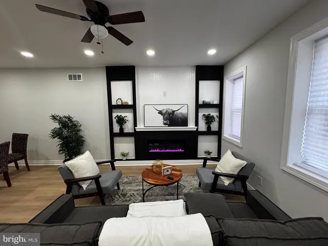 a living room with furniture and window