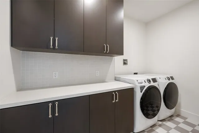 an empty room with wooden floor and a window