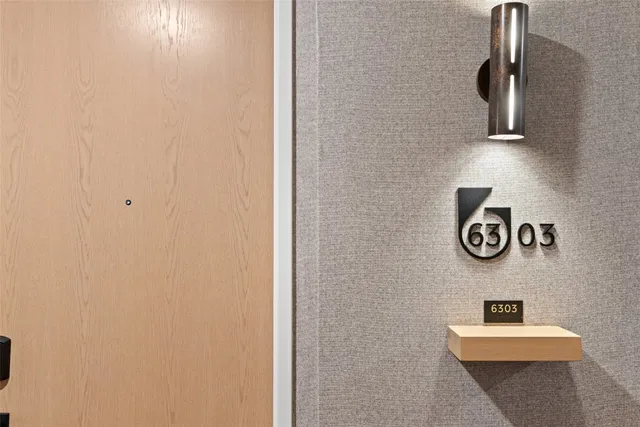 a open kitchen with stainless steel appliances granite countertop a sink a stove and a wooden floors