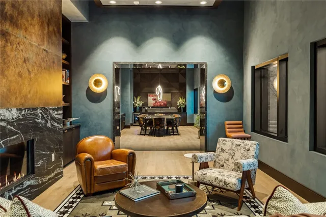 a living room with furniture and a rug