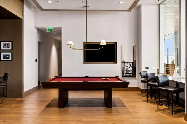 a view of kitchen with furniture and wooden floor