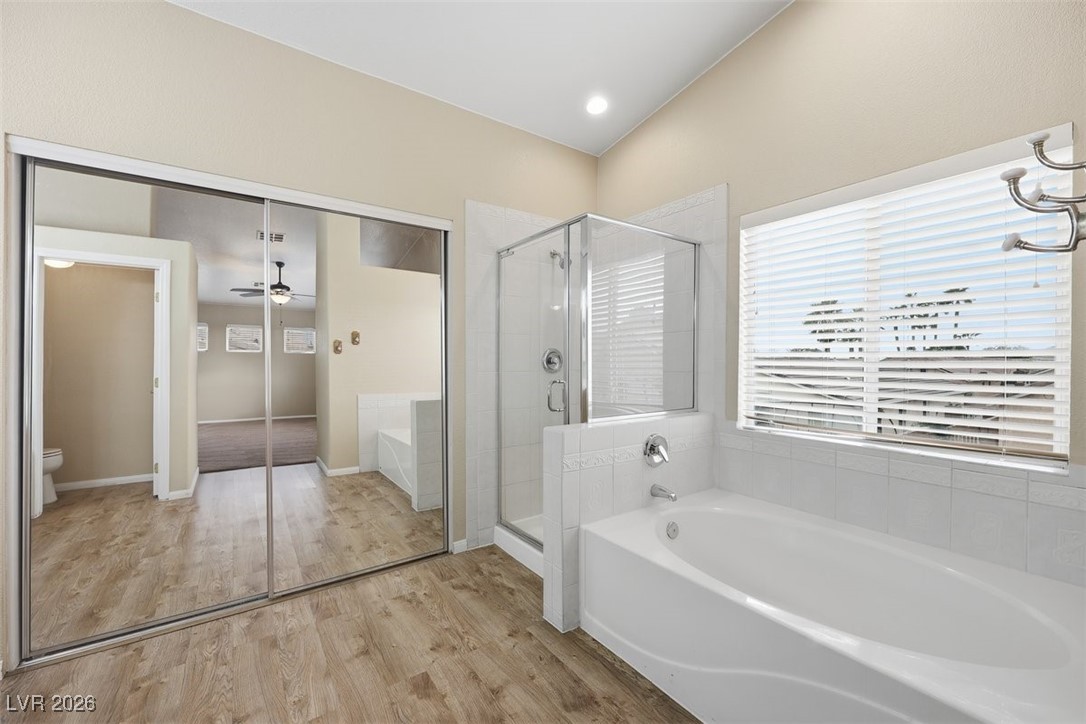 8125 West Back Packer Court Las Vegas, NV 89131 - Photo 15 of 31 Luxury vinyl floors, soaking tub, mirrored walk in closet doors!