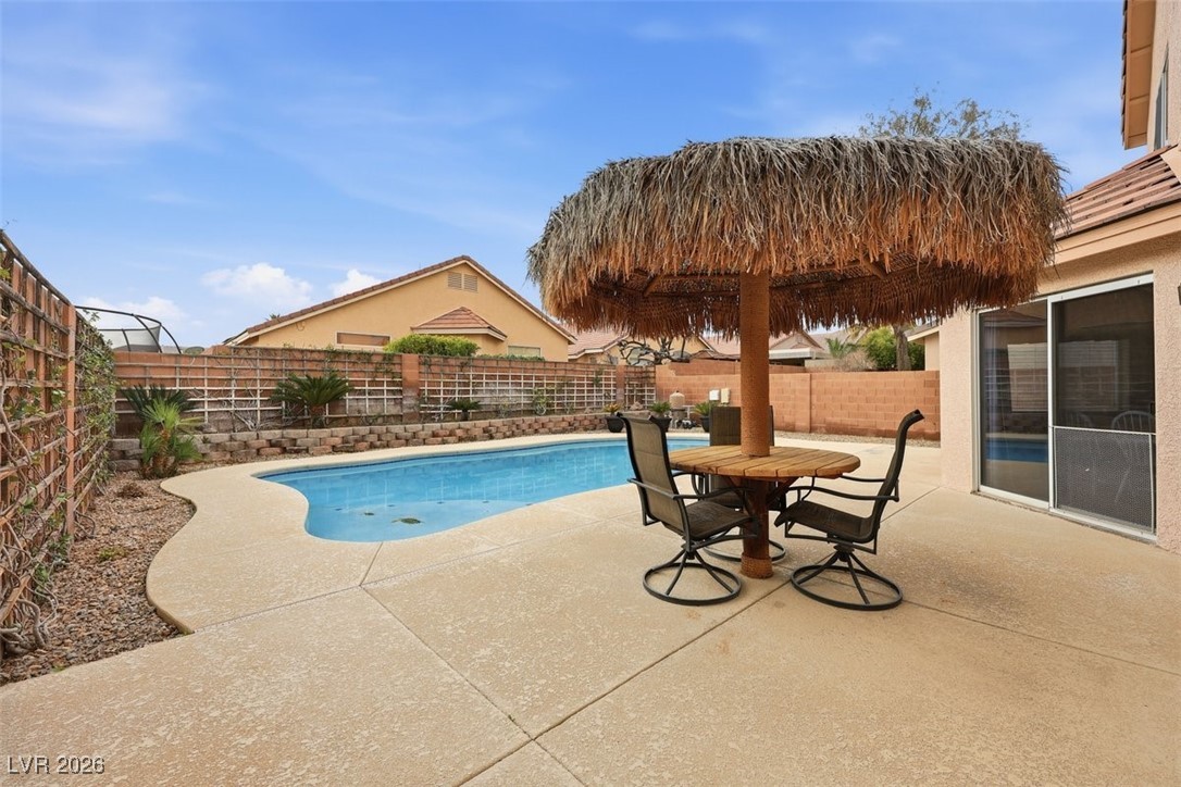 8125 West Back Packer Court Las Vegas, NV 89131 - Photo 2 of 31 Custom Palapa to enjoy your own Staycation!