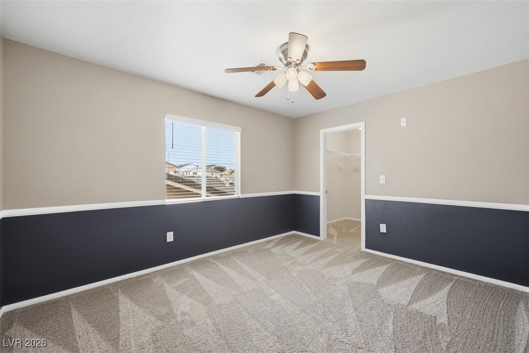 8125 West Back Packer Court Las Vegas, NV 89131 - Photo 21 of 31 Bedroom with C-fan and walk in closet