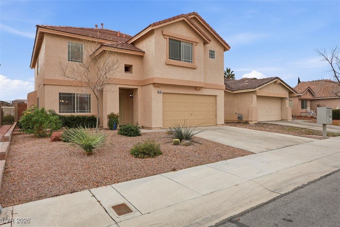 8125 West Back Packer Court Las Vegas, NV 89131 - Photo 25 of 31 Awesome curb appeal!! whoa 2.5 GARAGE could fit 3 small cars!!