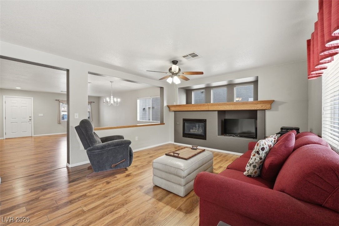 8125 West Back Packer Court Las Vegas, NV 89131 - Photo 6 of 31 Relax & enjoy this great family room with a Fireplace!