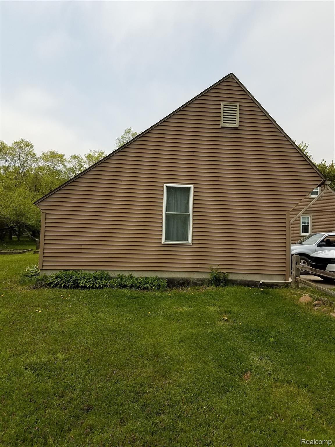 3638 Innisfree Road Howell, MI 48855 - Photo 42 of 45 Garage side elevation.jpg
