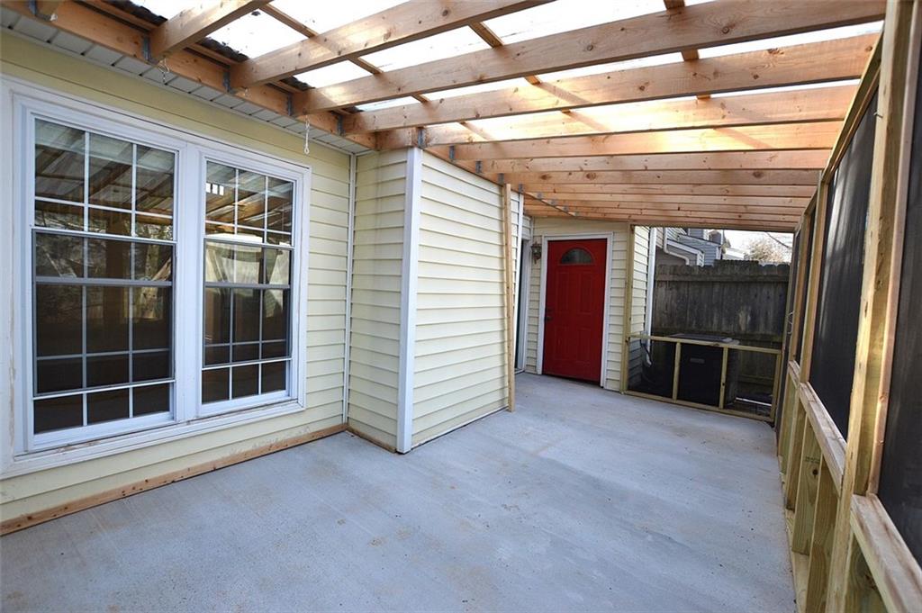 2085 Sand Wedge Circle Kennesaw, GA 30144 - Photo 32 of 35 a view of an empty room with a window