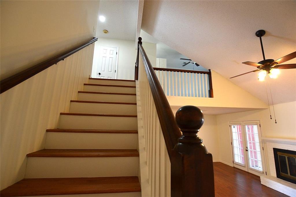 2085 Sand Wedge Circle Kennesaw, GA 30144 - Photo 10 of 35 a view of entryway and hall with wooden floor