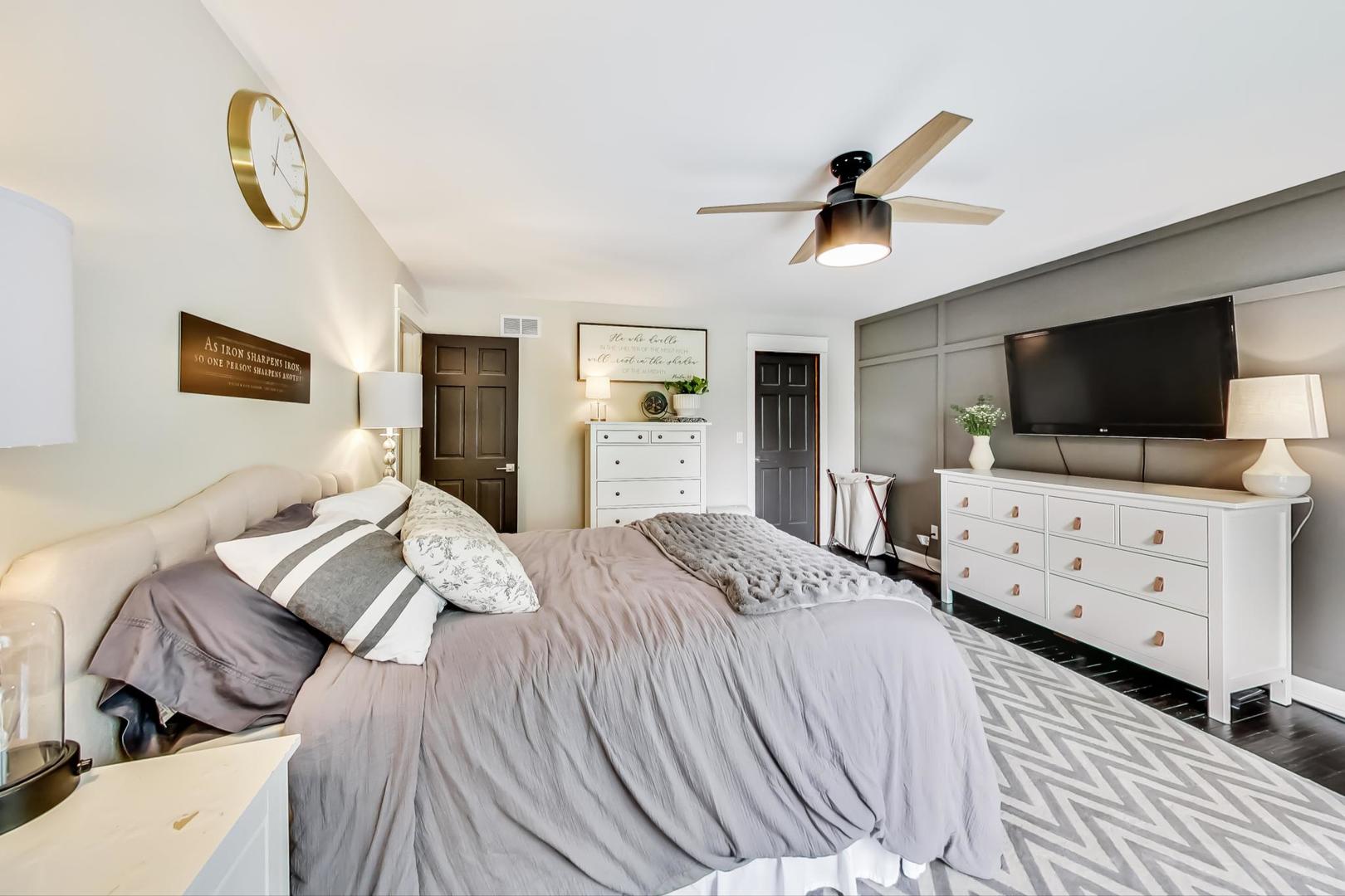 2230 Forest Ridge Road St. Charles, IL 60174 - Photo 21 of 37 a bedroom with a bed and a flat screen tv