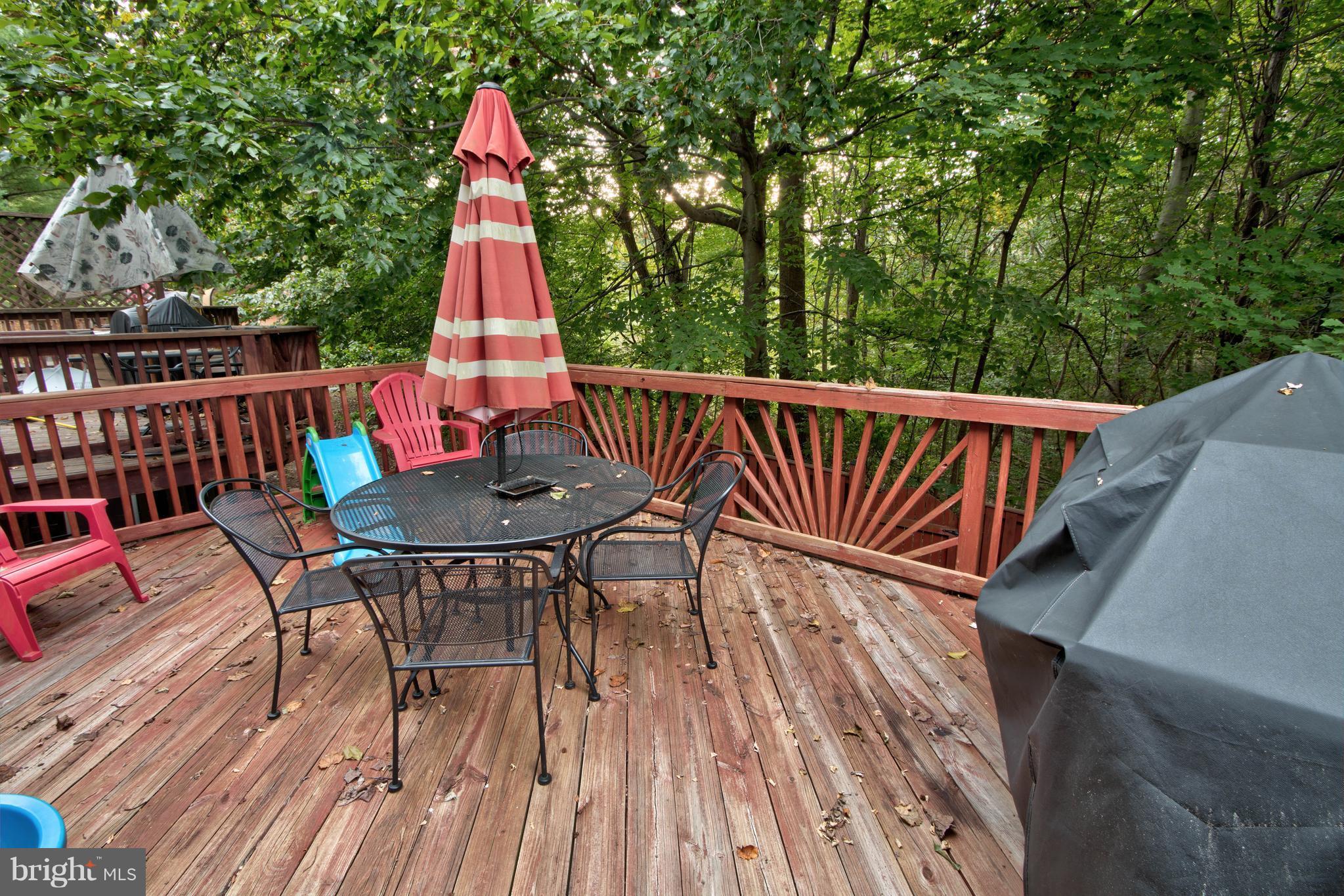 704 Streamside Drive Bowie, MD 20721 - Photo 22 of 24 a view of balcony with deck and furniture