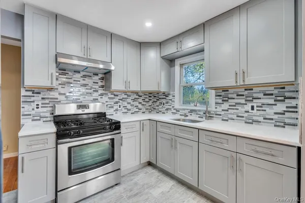 $574,999 | 64 Spar Drive, Mastic Beach, NY 11951