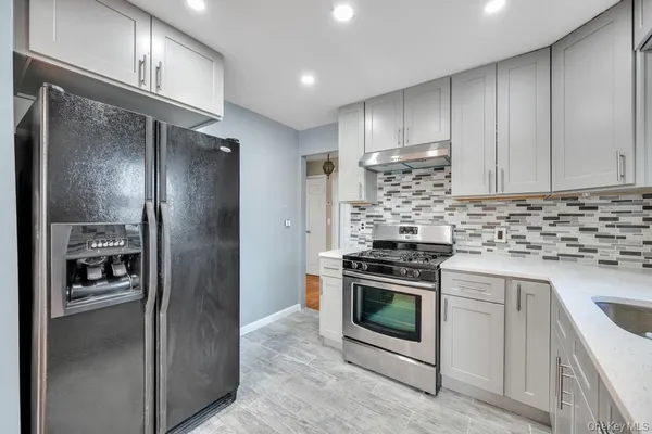 $574,999 | 64 Spar Drive, Mastic Beach, NY 11951