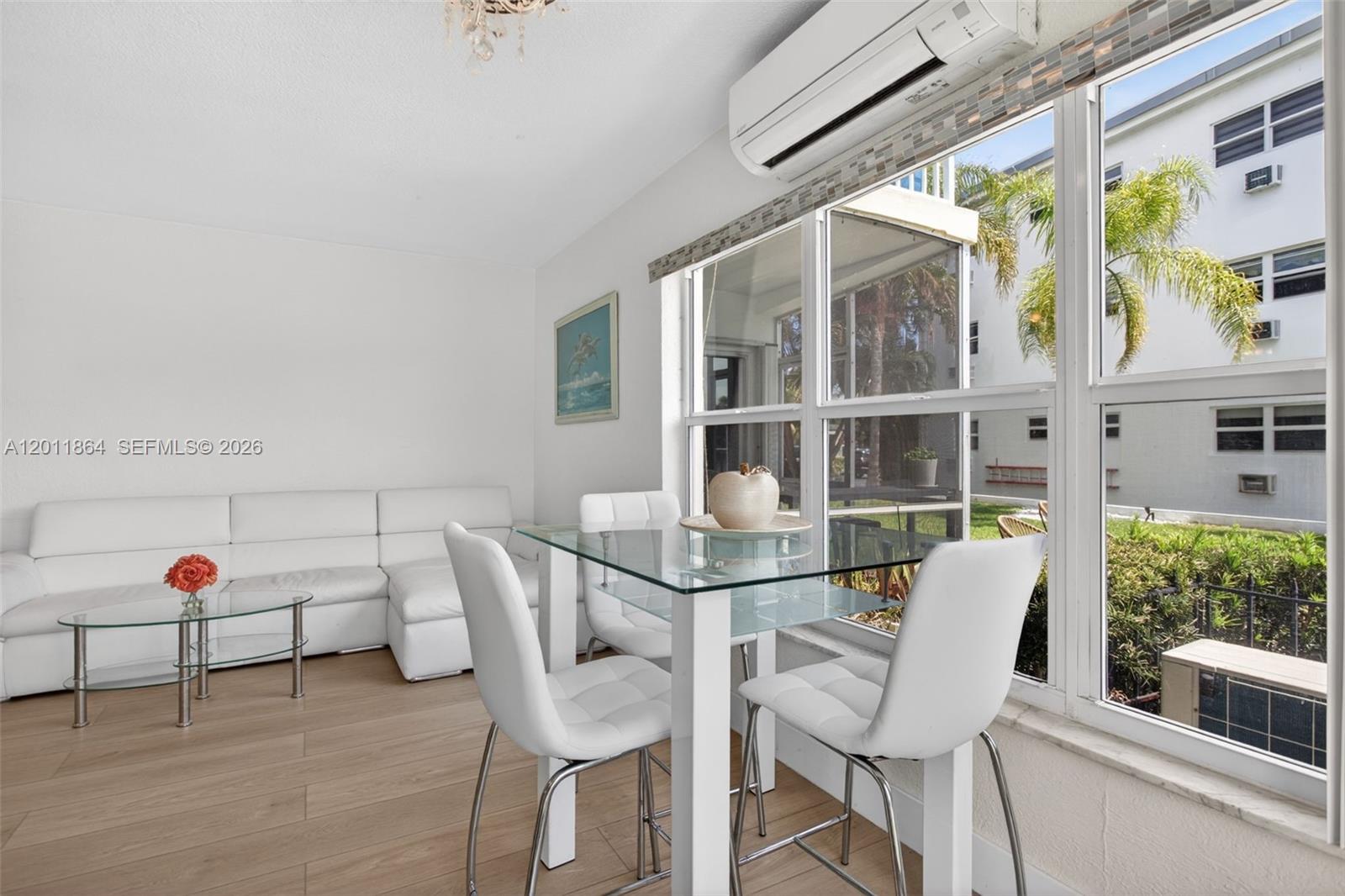 615 South Riverside Drive, Unit 5 Pompano Beach, FL 33062 - Photo 7 of 29 a view of table and chairs in patio