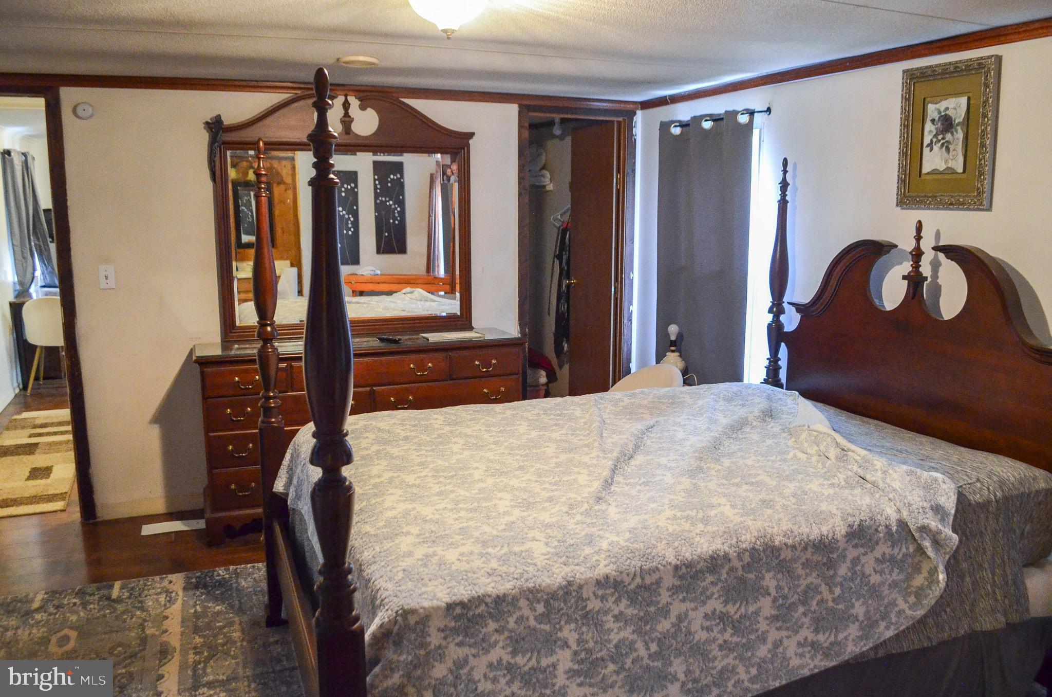 2001 Red Bank Road Dover, PA 17315 - Photo 17 of 19 a bedroom with a bed dresser and a window