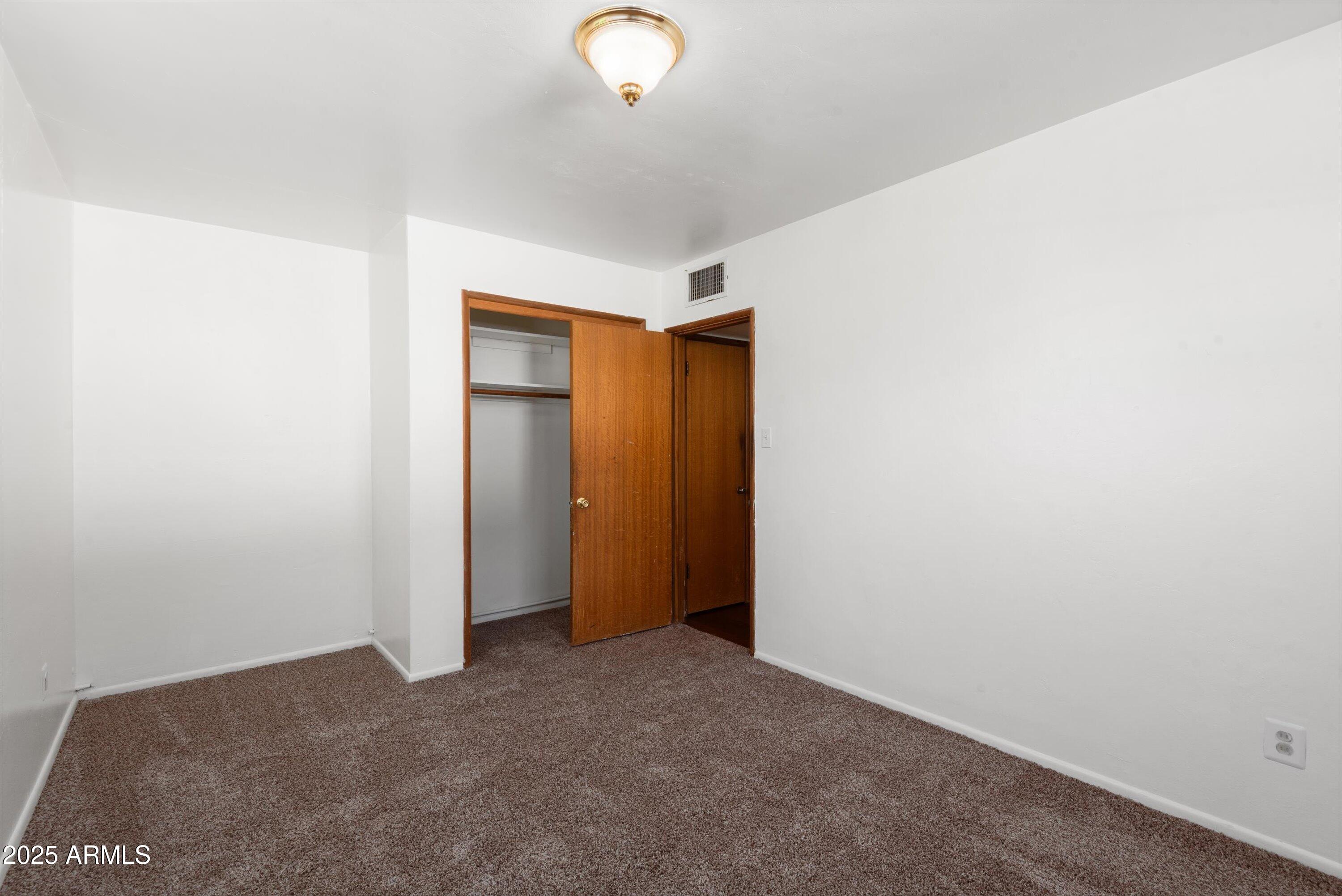 2217 West Gardenia Drive Phoenix, AZ 85021 - Photo 18 of 32 a view of an empty room