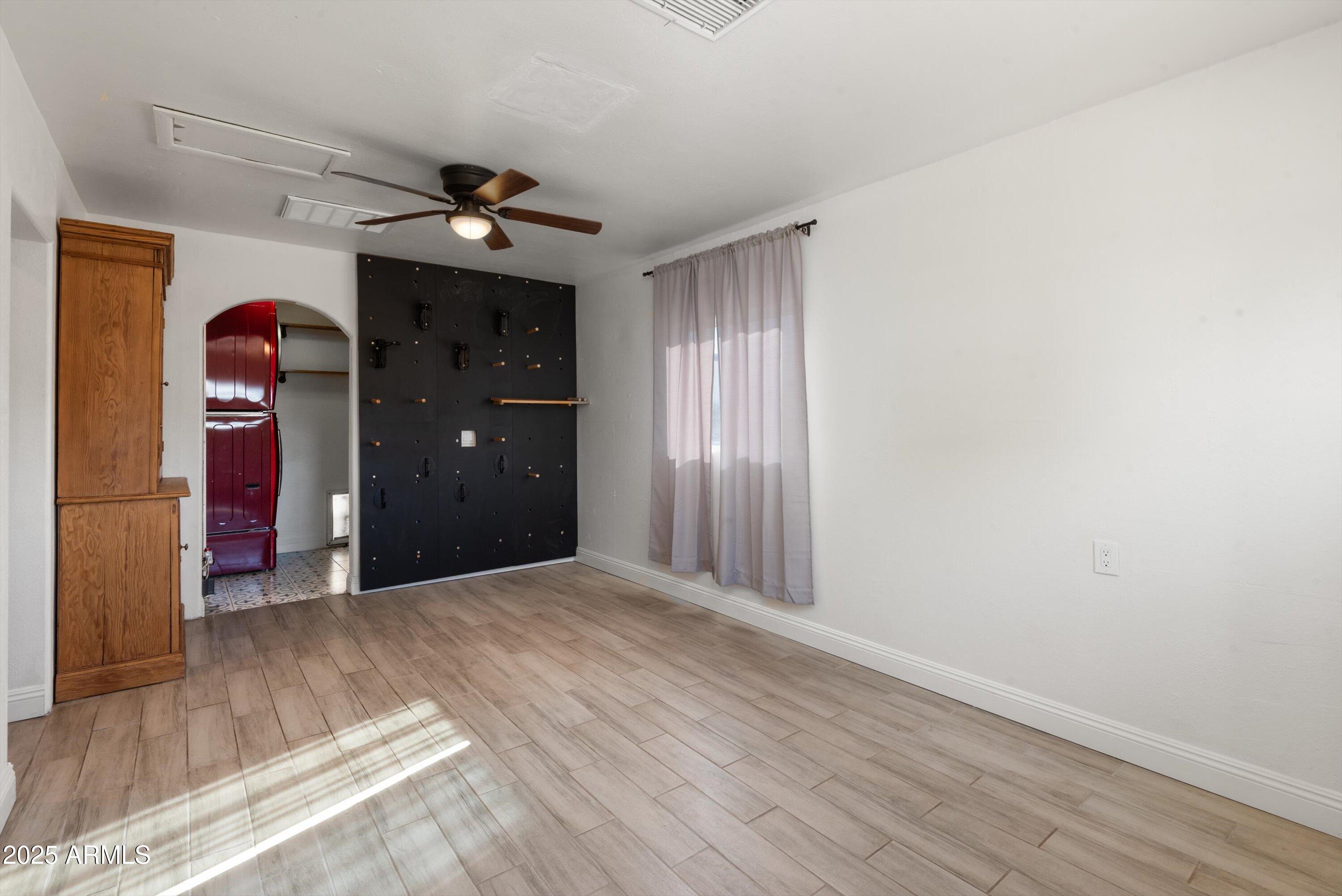 2217 West Gardenia Drive Phoenix, AZ 85021 - Photo 22 of 32 a view of a livingroom with a chandelier fan