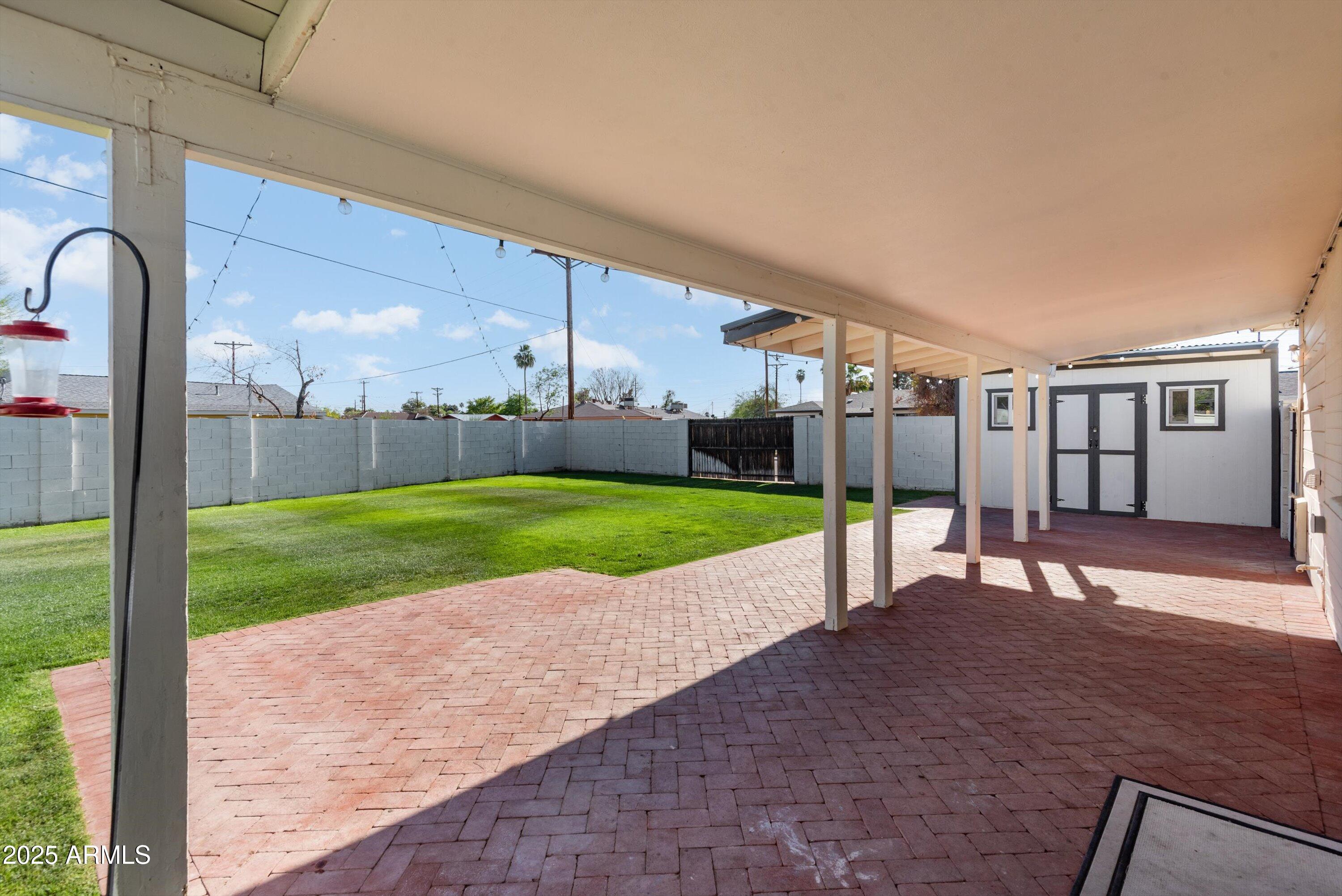 2217 West Gardenia Drive Phoenix, AZ 85021 - Photo 25 of 32 a view of a house with a yard