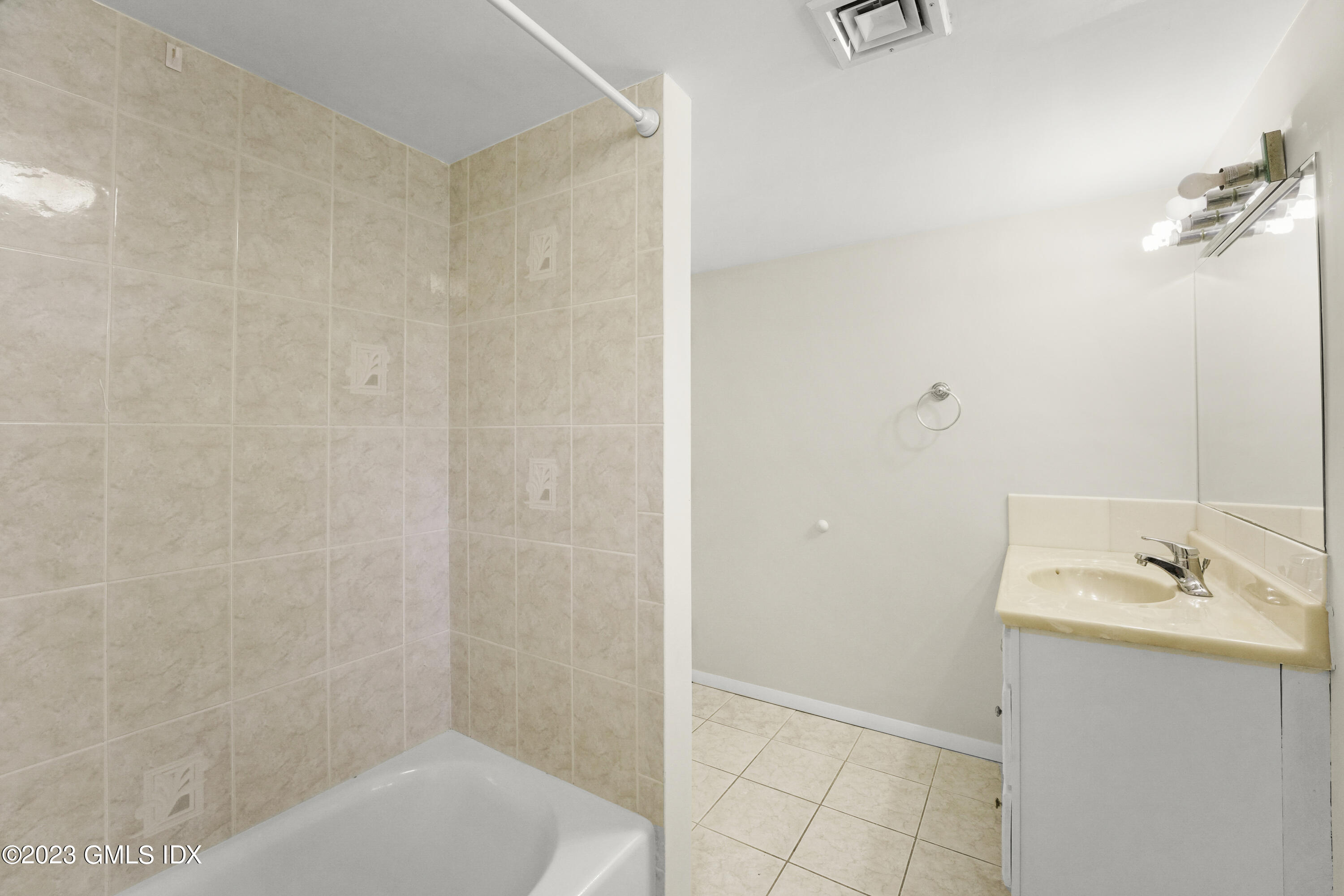 27 Silver Beech Road Riverside, CT 06878 - Photo 14 of 19 a bathroom with a sink and shower