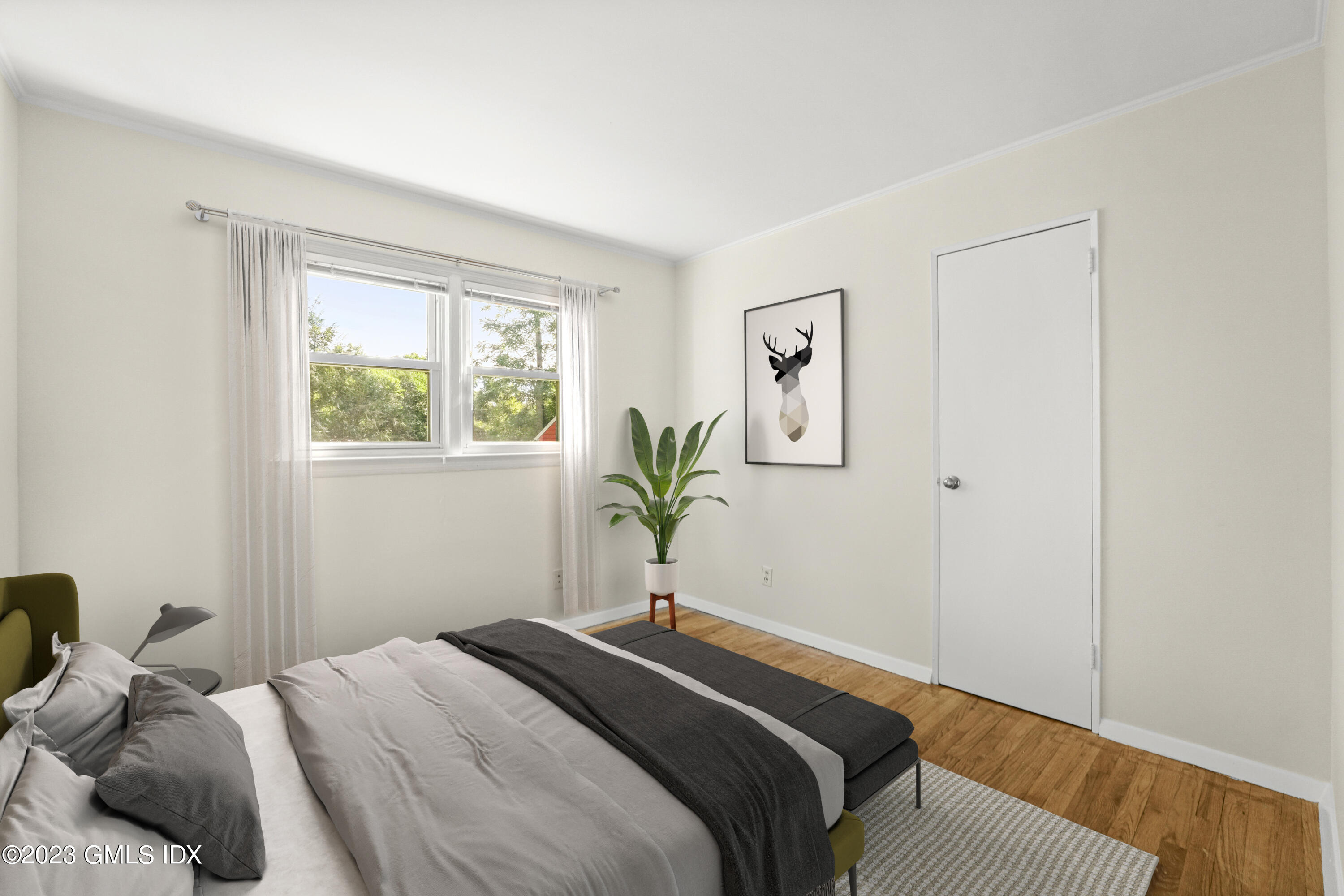 27 Silver Beech Road Riverside, CT 06878 - Photo 9 of 19 a bedroom with a bed and a window