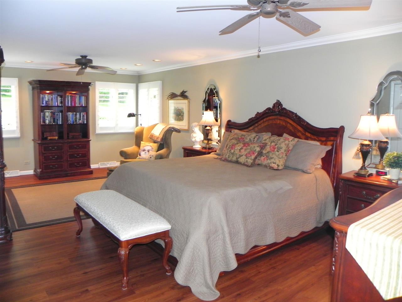 512 Baintree Road Lake Summerset, IL 61019 - Photo 21 of 25 a bedroom with a bed and window
