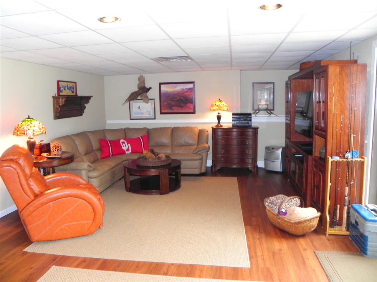 512 Baintree Road Lake Summerset, IL 61019 - Photo 24 of 25 a living room with furniture and a wooden floor