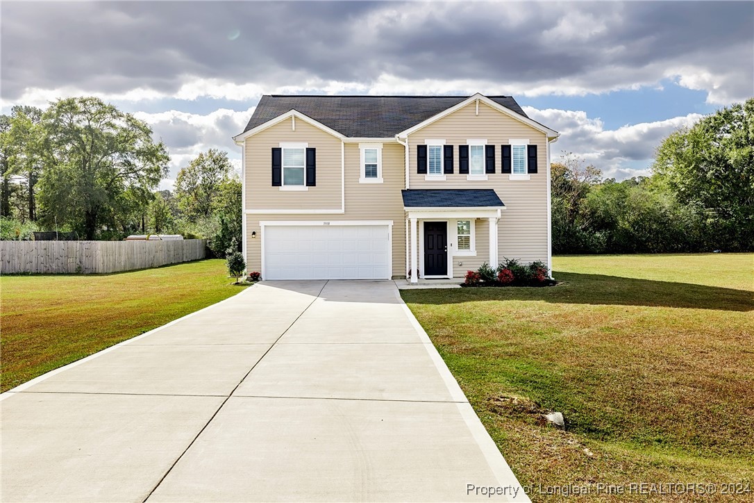 5918 Lowgrass Road Stedman, NC 28391 - Photo 1 of 32 a front view of a house with yard