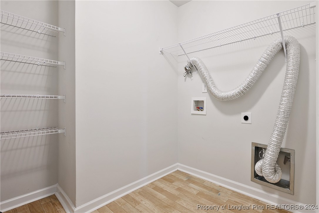 5918 Lowgrass Road Stedman, NC 28391 - Photo 23 of 32 a bathroom with a window and a shower