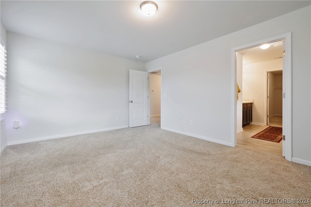 5918 Lowgrass Road Stedman, NC 28391 - Photo 26 of 32 an empty room with a bathroom