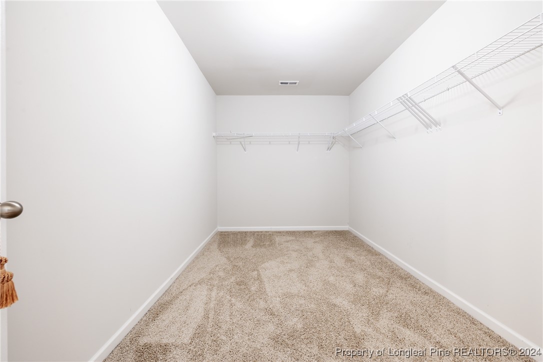 5918 Lowgrass Road Stedman, NC 28391 - Photo 31 of 32 an empty room with a empty shelves