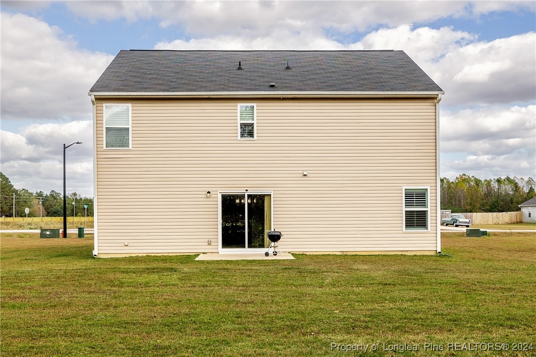 5918 Lowgrass Road Stedman, NC 28391 - Photo 5 of 32 a view of a house with a yard