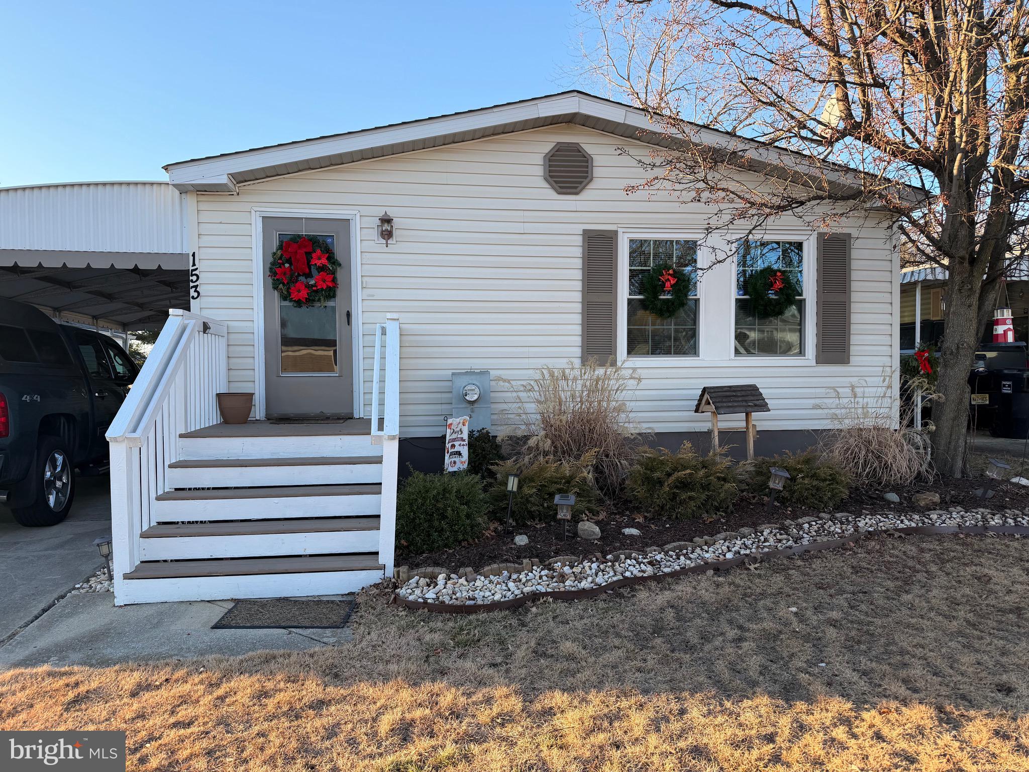 a front view of a house with a porch