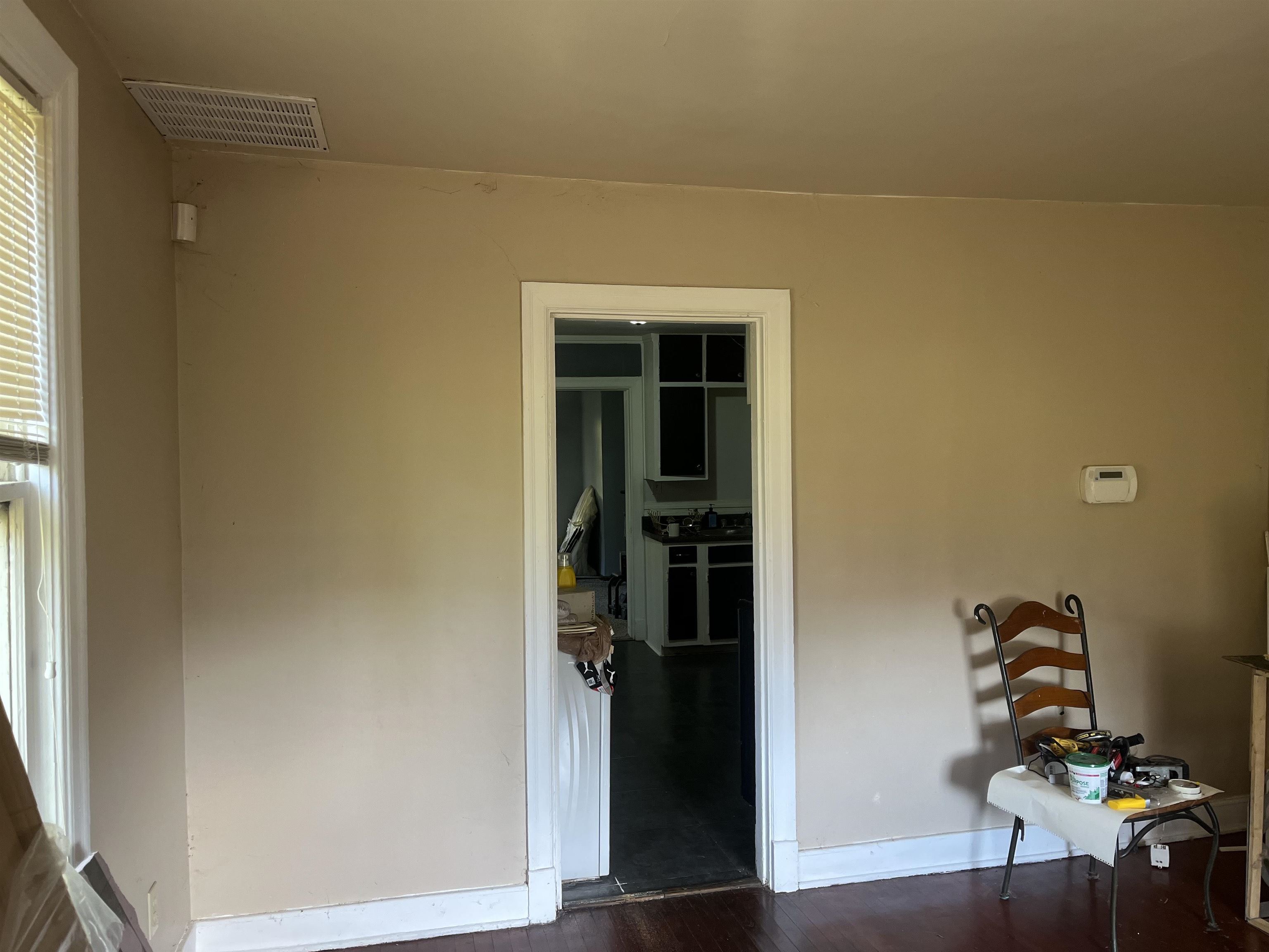 3382 Ardmore Street Memphis, TN 38127 - Photo 2 of 6 Bedroom featuring baseboards, dark wood finished floors, and visible vents