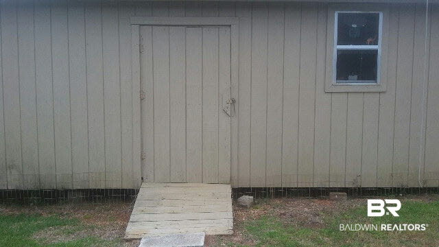 8451 Kendall Court Mobile, AL 36695 - Photo 30 of 33 HUGE 12x24 floored shed/workshop with electricity.
