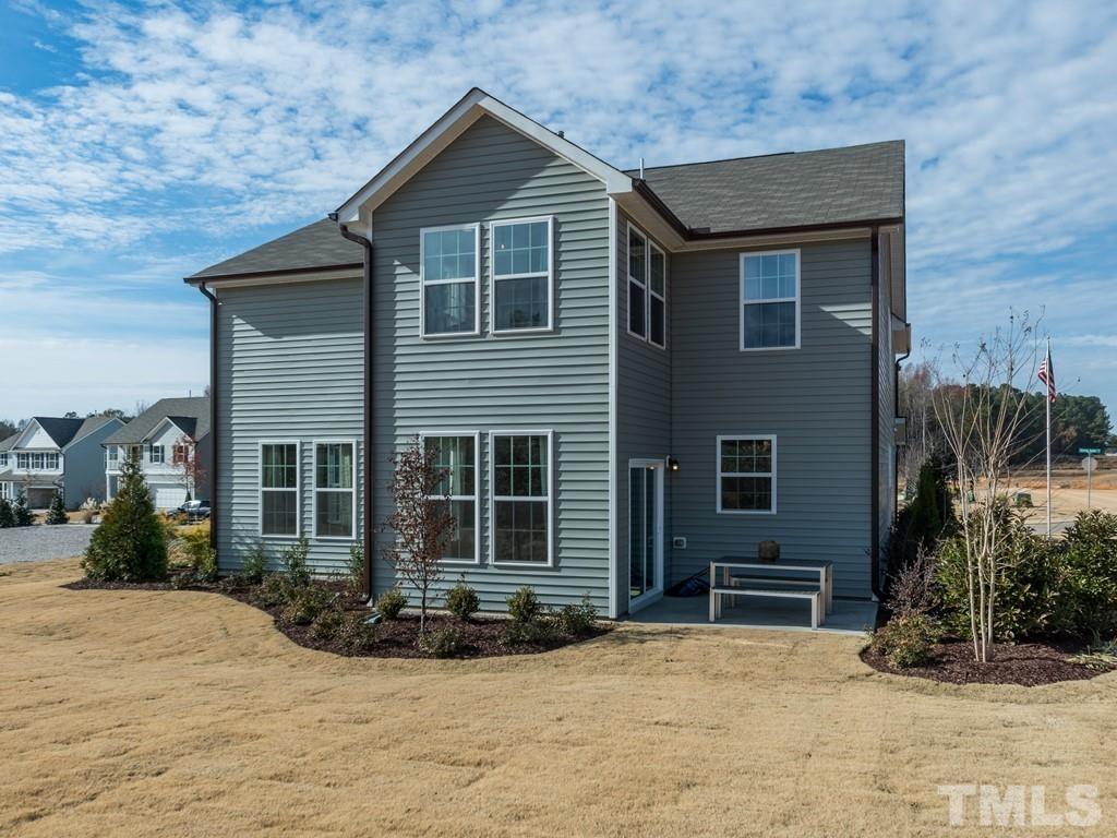 104 Red Cardinal Way Angier, NC 27501 - Photo 25 of 26 a view of a house with a yard