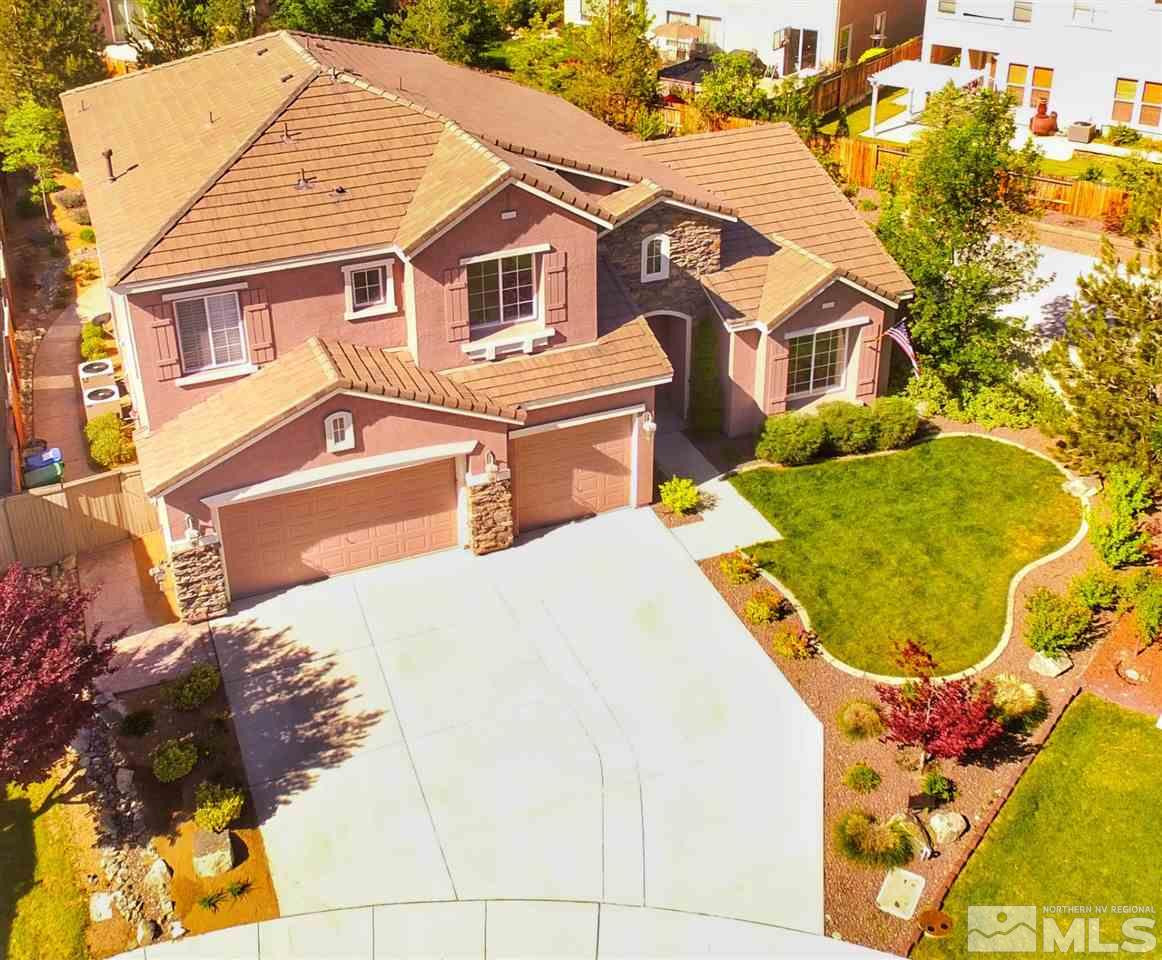 10075 Goler Wash Court Reno, NV 89521 - Photo 1 of 1 a view of a white house with a swimming pool