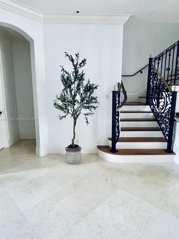 a view of entryway with a front door