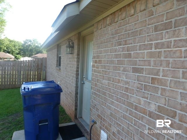 9429 Fox Court East Semmes, AL 36575 - Photo 22 of 27 SIDE ENTRY FROM LAUNDRY R