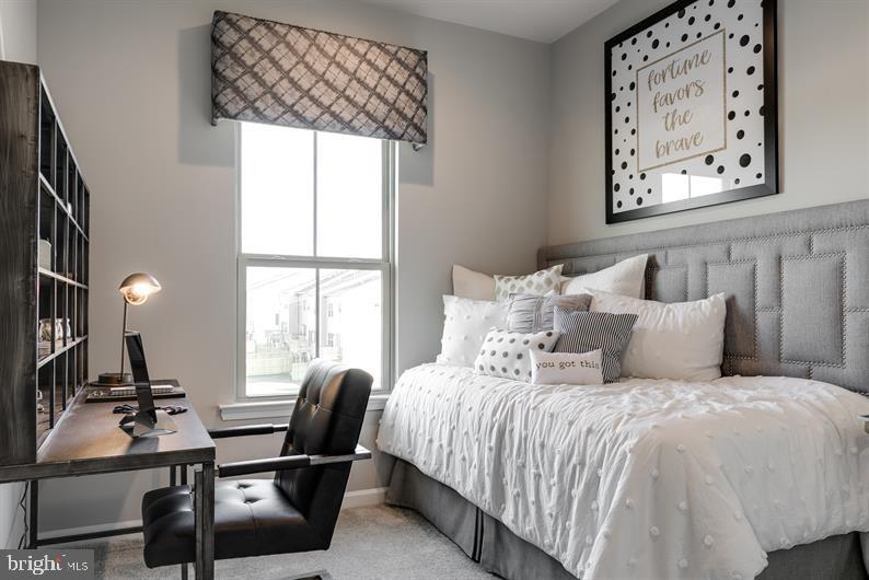 7895 Mine Run Road Hanover, MD 21076 - Photo 24 of 24 a bedroom with a bed and a large window