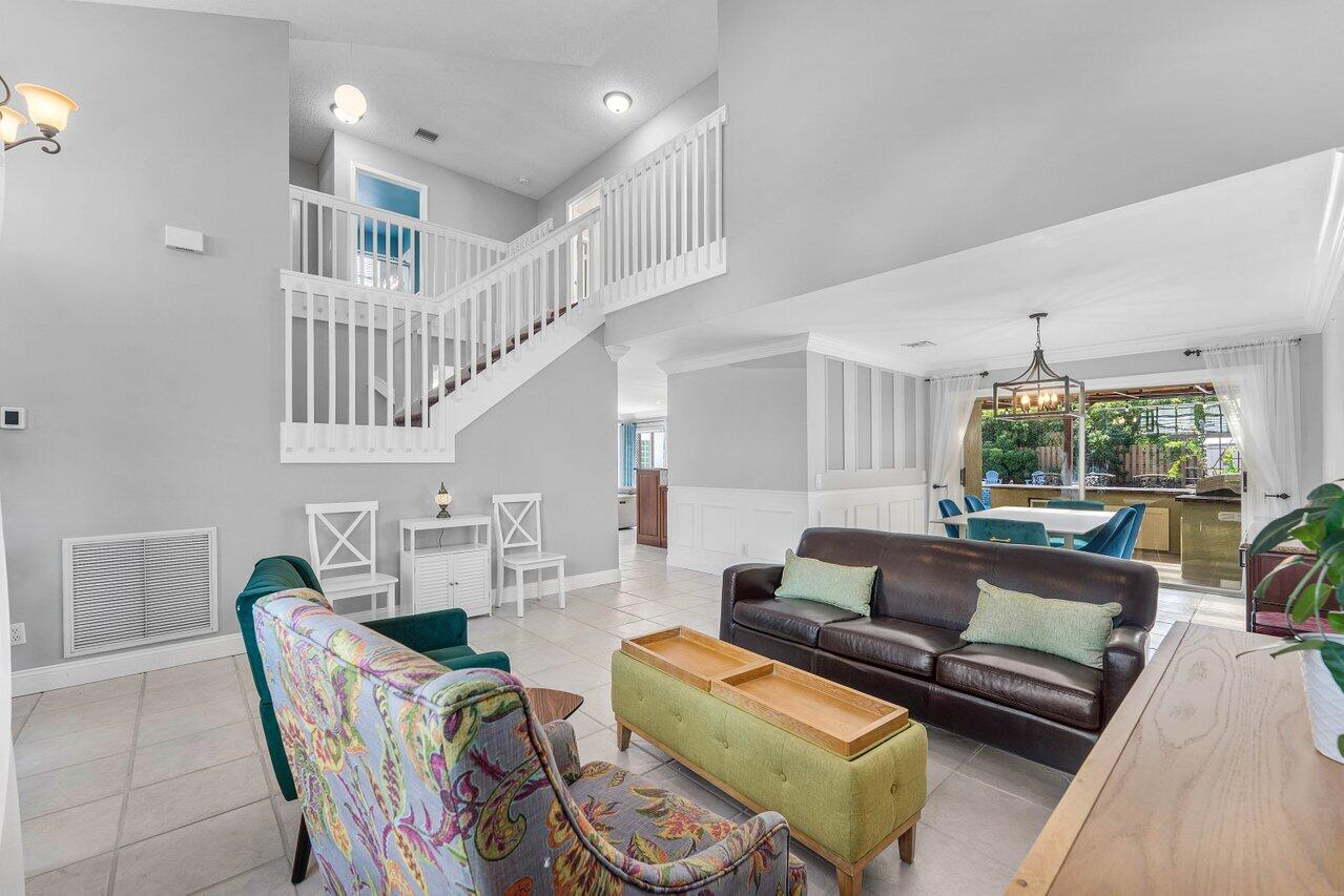 9434 Fox Trot Lane Boca Raton, FL 33496 - Photo 6 of 66 a living room with furniture and a large window