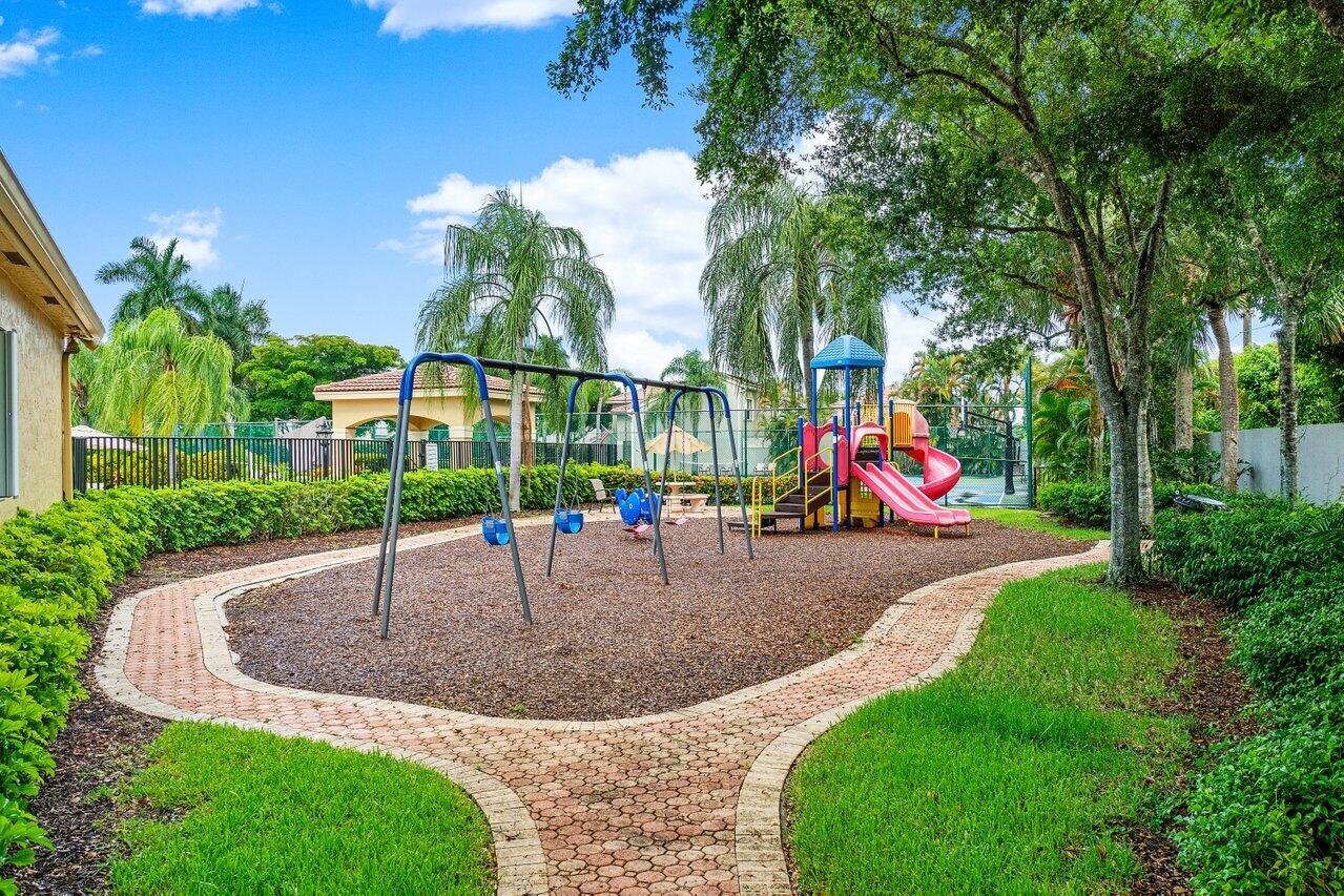 9434 Fox Trot Lane Boca Raton, FL 33496 - Photo 64 of 66 a view of outdoor space yard and porch