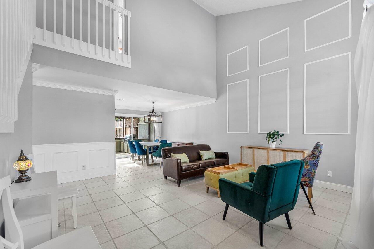 9434 Fox Trot Lane Boca Raton, FL 33496 - Photo 7 of 66 a living room with furniture and a window