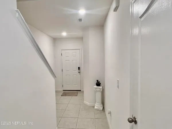 a bathroom with a shower and a toilet