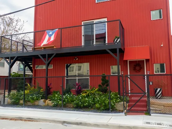 front view of a house with a street