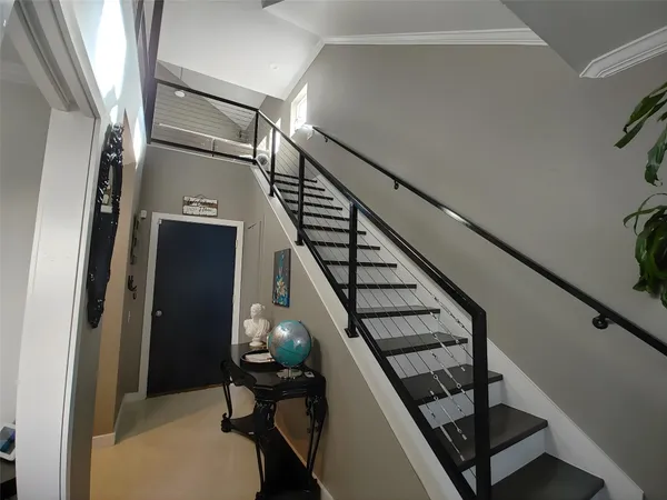 a view of entryway with wooden floor