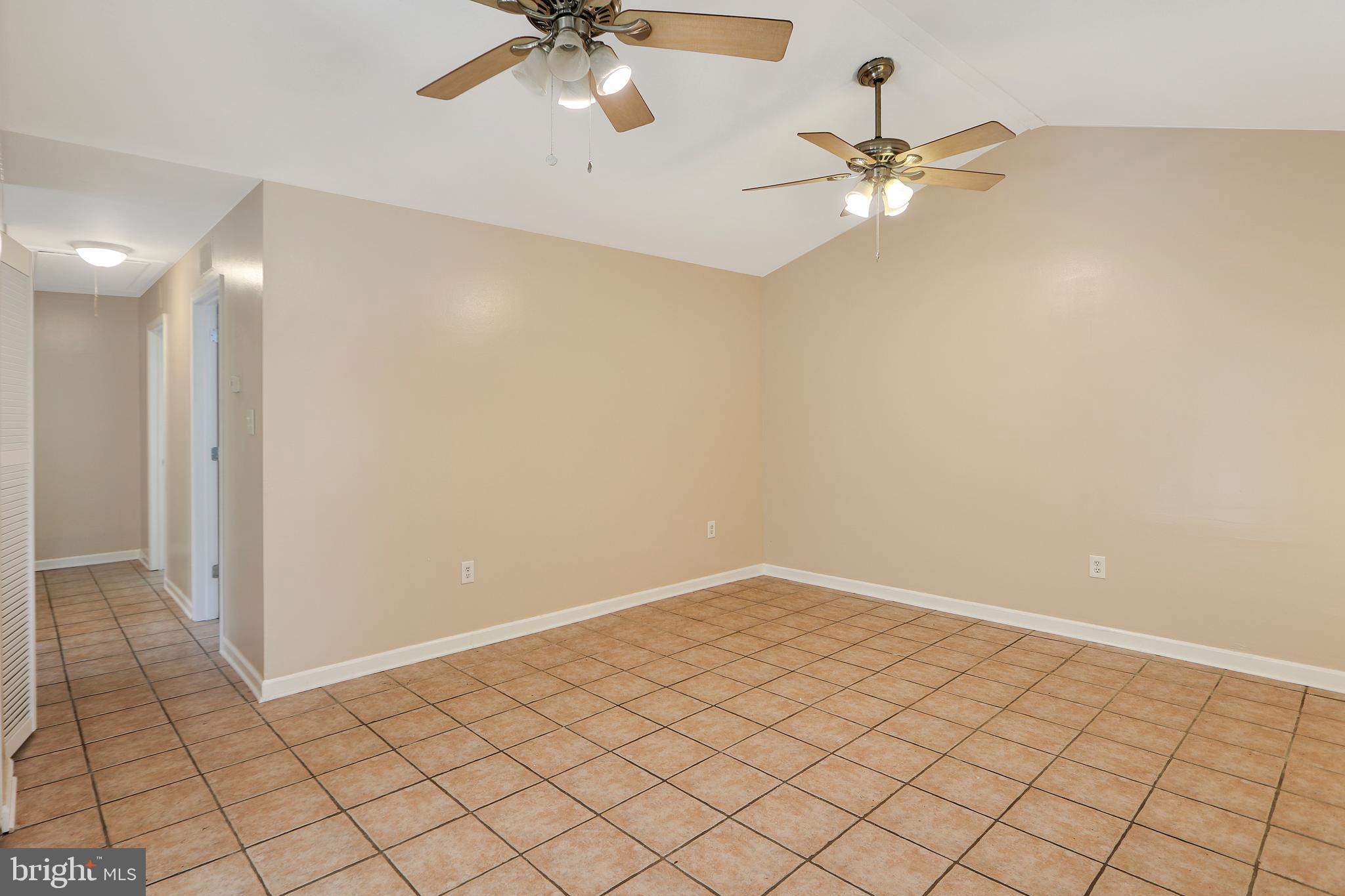 301 Pond View Lane Bear, DE 19701 - Photo 7 of 11 an empty room and chandelier fan