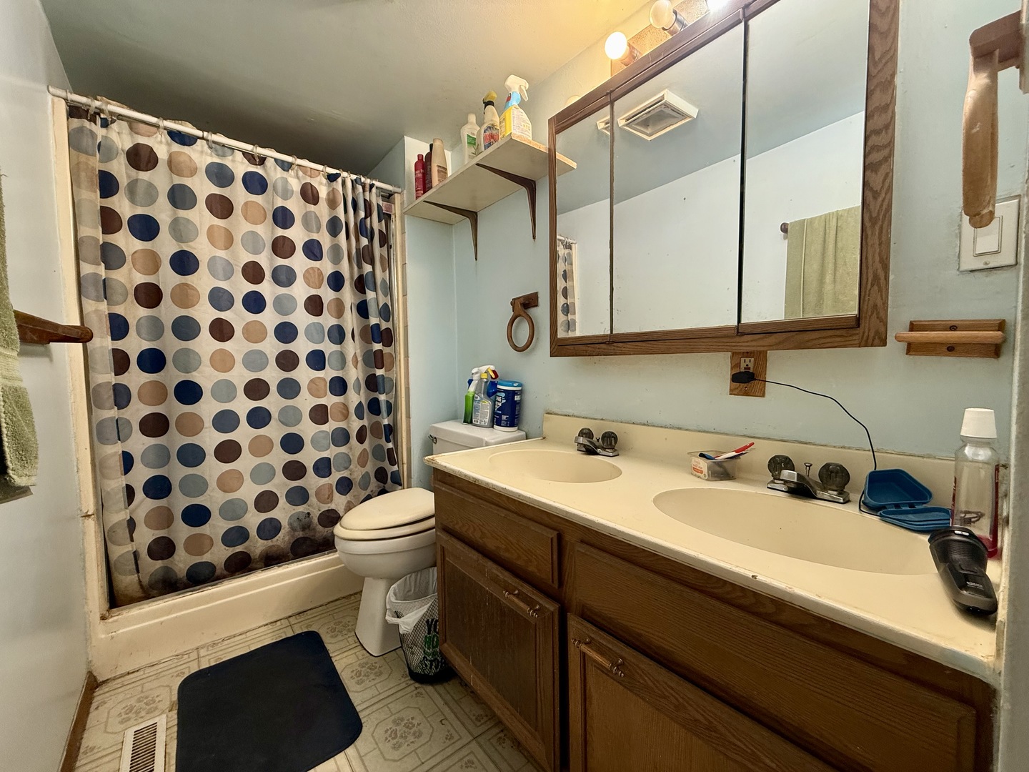 988 Spruce Lane St. Anne, IL 60964 - Photo 6 of 7 a bathroom with a sink toilet and shower