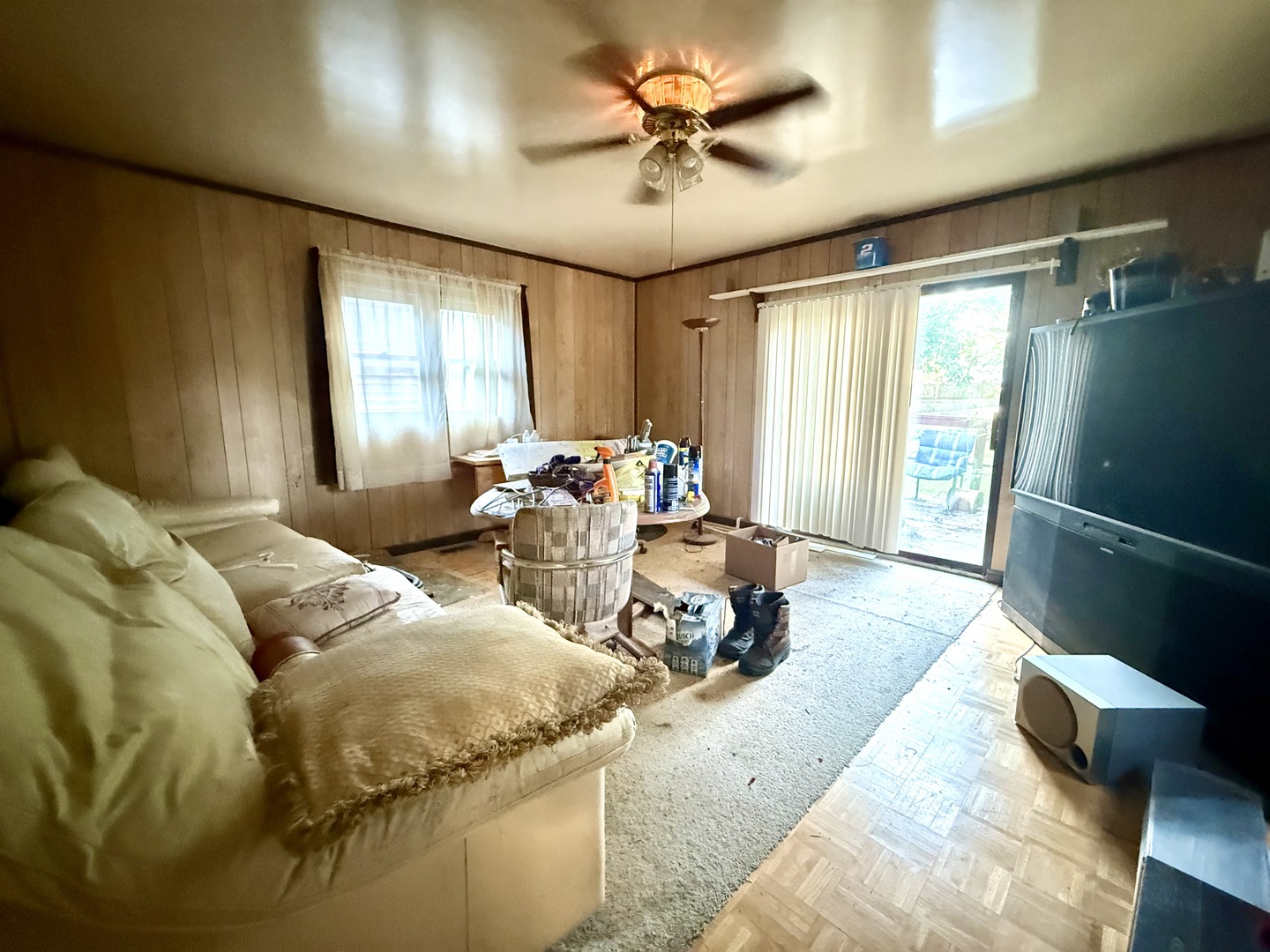 988 Spruce Lane St. Anne, IL 60964 - Photo 7 of 7 a living room with furniture and a large window