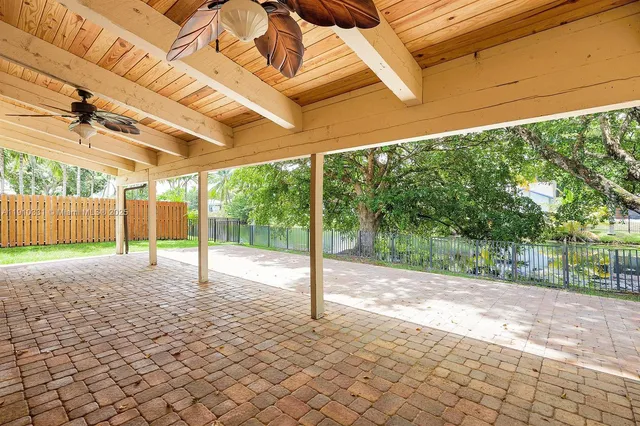 a house with trees in the background