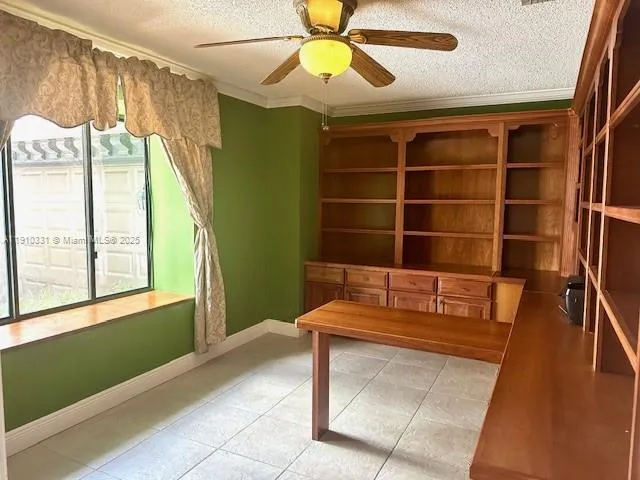 a room with furniture and a window